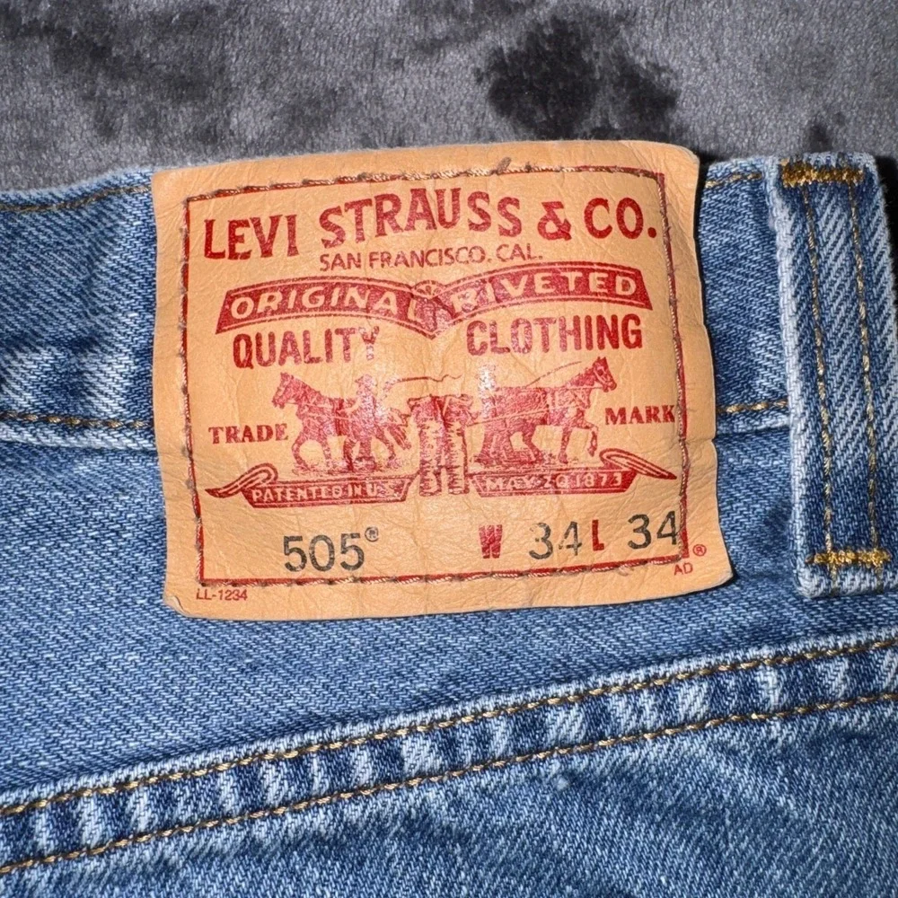 Levis 550 Regular Fit Straight Leg Jeans Mens 34x34 Medium Wash Blue Denim